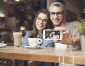 Couple Smiling Selfie Coffee Shop